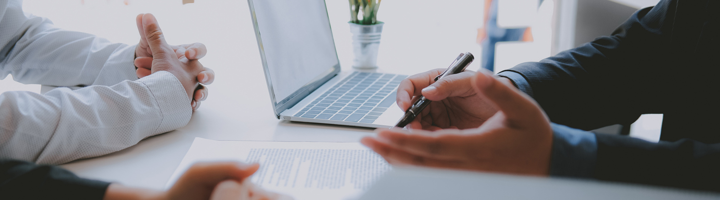 couple on computer and laptop